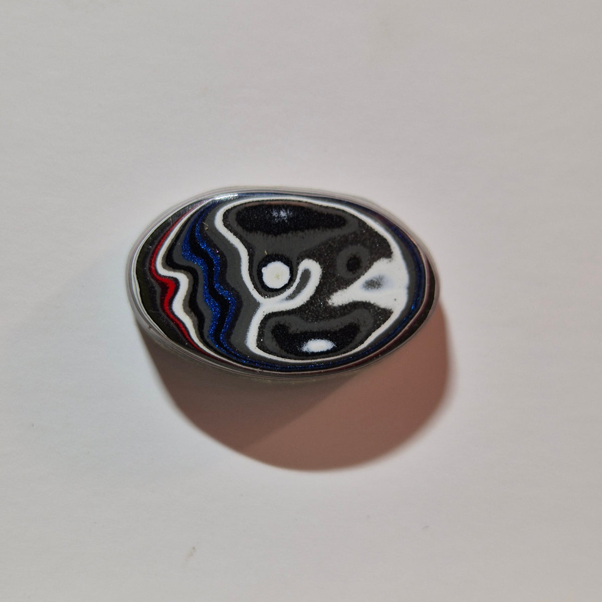 Fordite cabochon