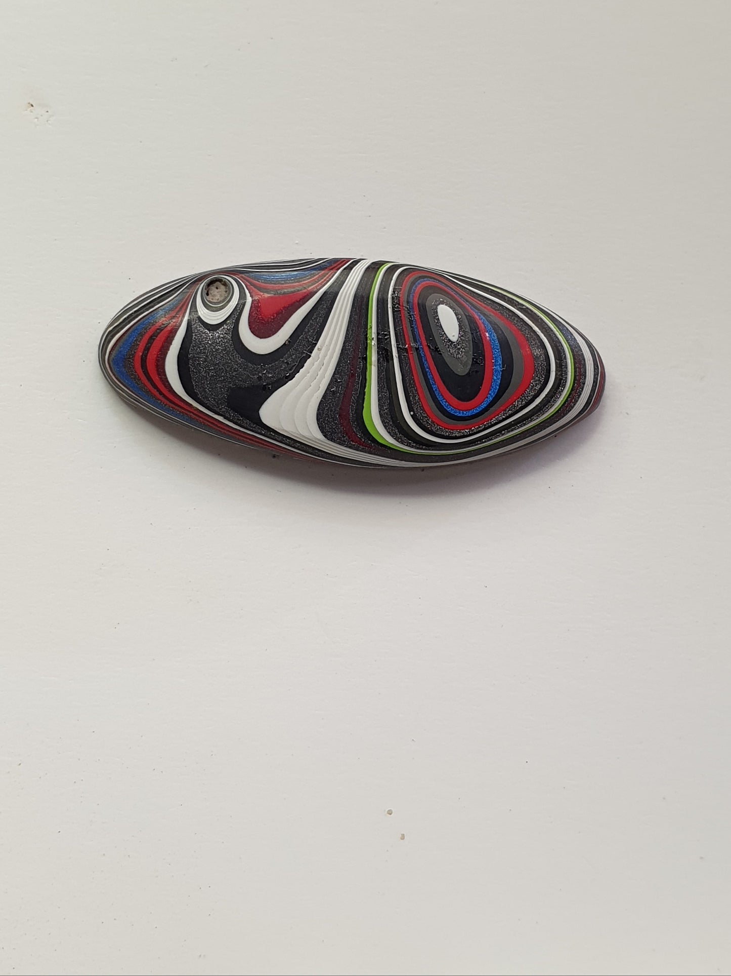 Fordite cabochon