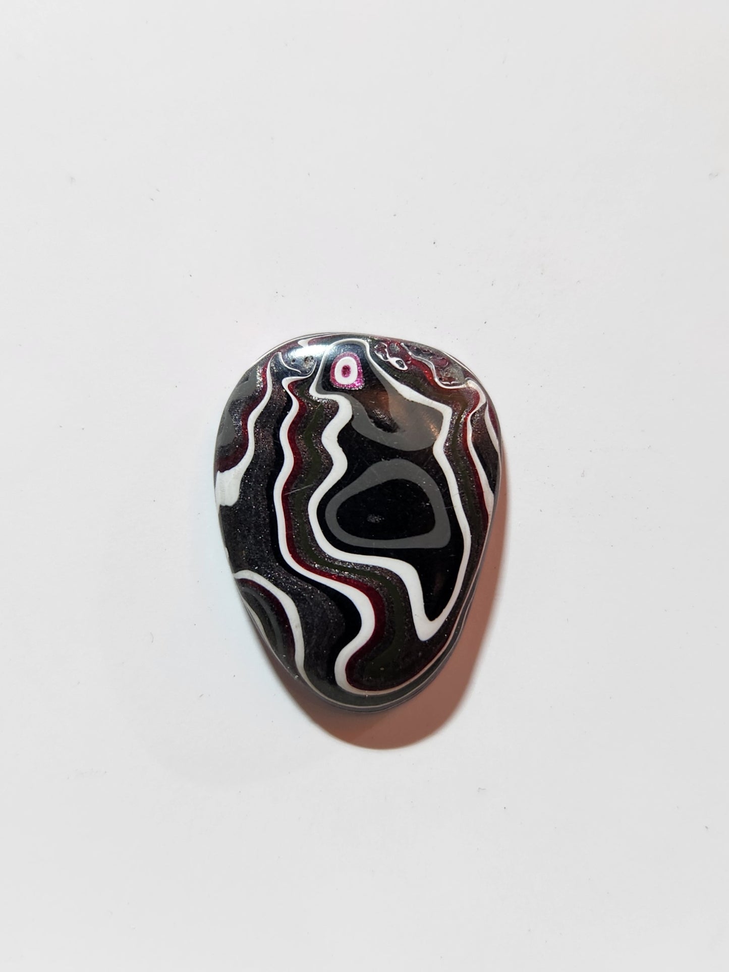 Fordite cabochon