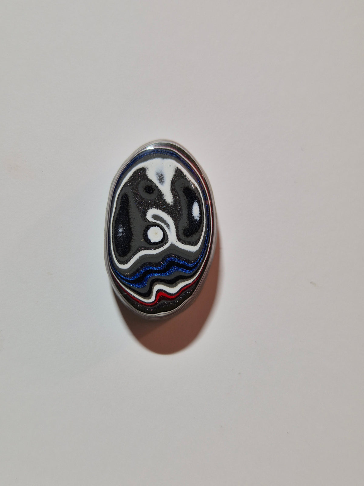 Fordite cabochon
