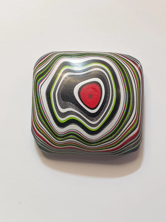 Fordite cabochon