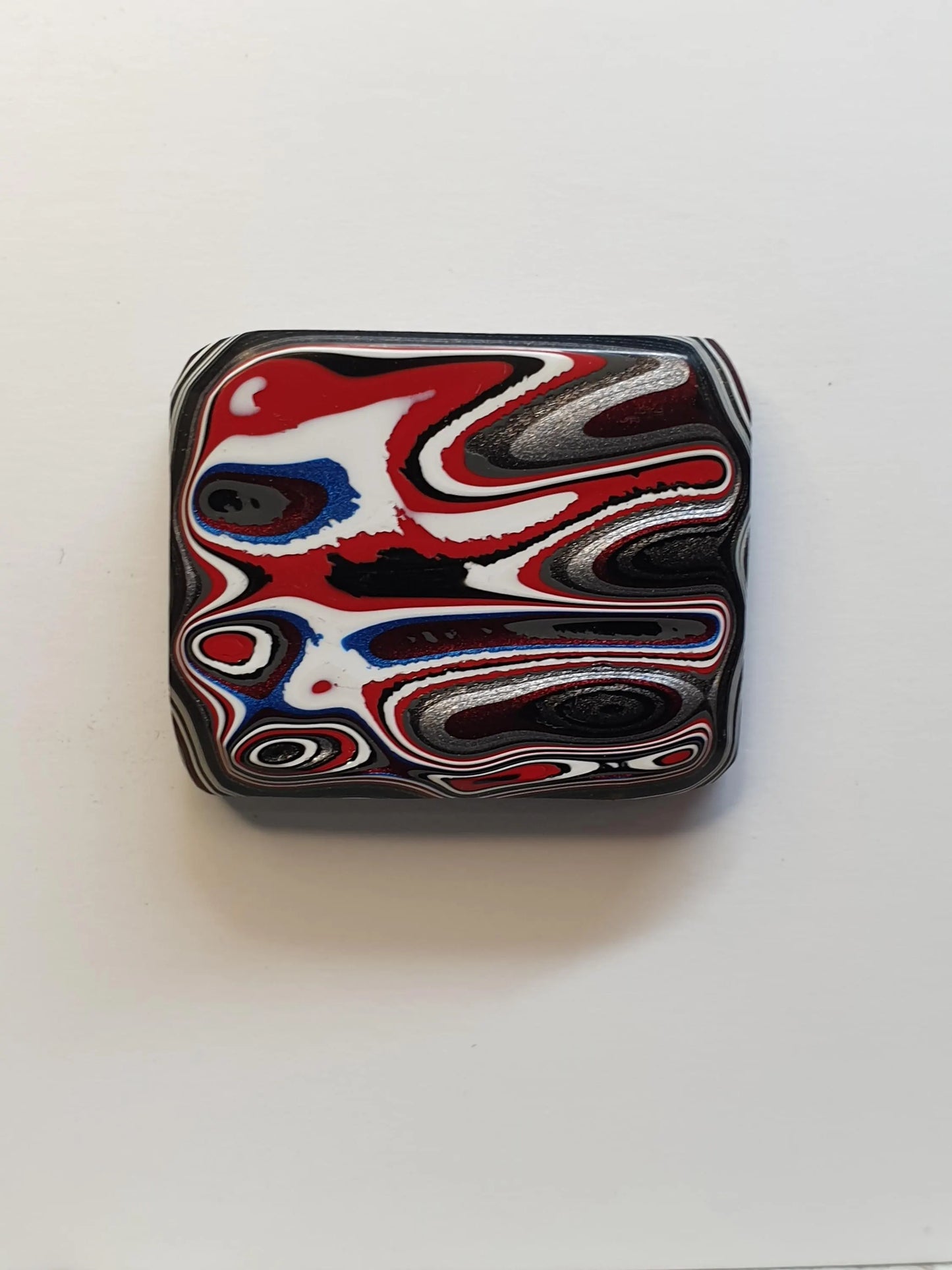 Fordite cabochon