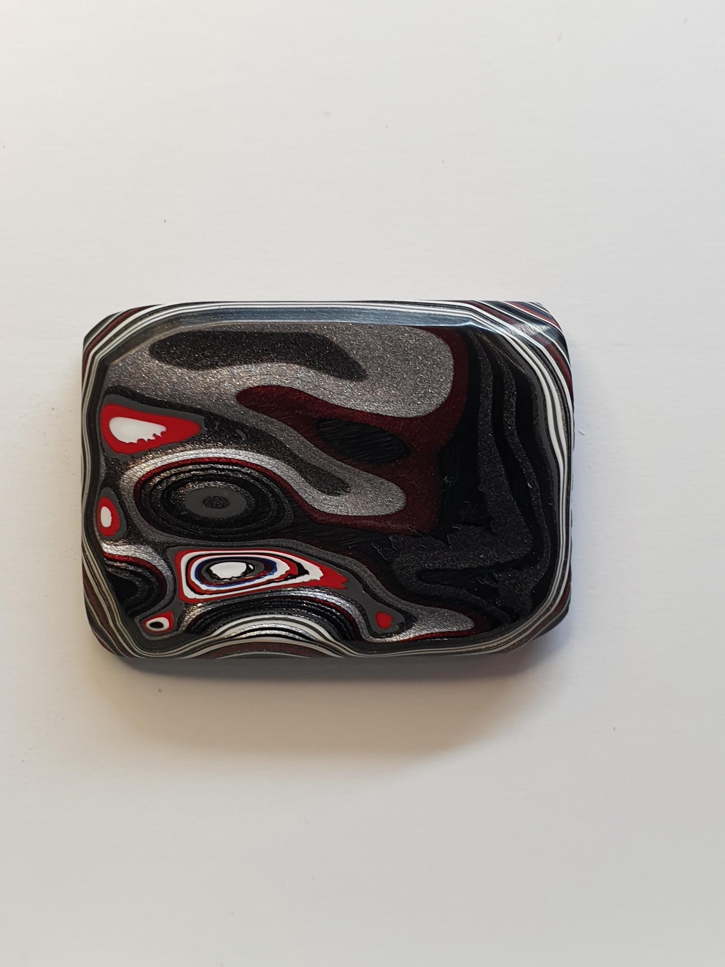 Fordite cabochon