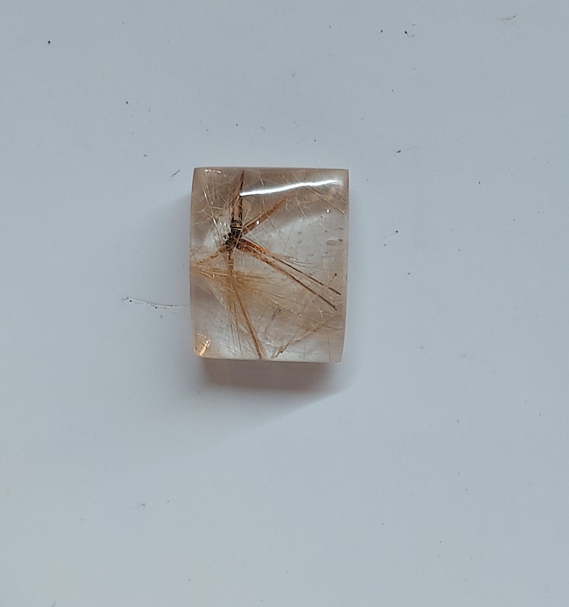 Rutilated quartz cabochon - Brighton Gemstones